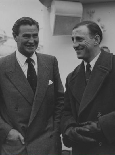 Australian cricketer Keith Miller chats to England cricket captain Len Hutton in 1956. Photograph: L.Blandford/Getty Images