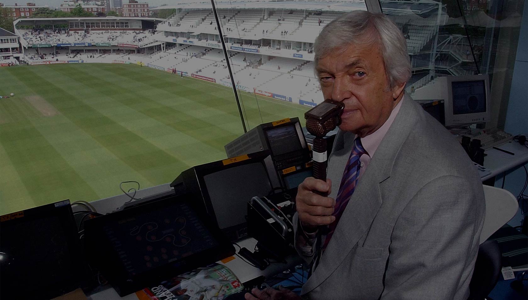 Former Australian spinner Richie Benaud in the Channel 4 commentary box at Lords, London in his 500th Test match as a commentator