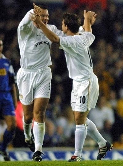 Mark Viduka celebrates a goal with Leeds teammate Harry Kewell at Elland road in 2001. Photograph: Odd Andersen/AFP
