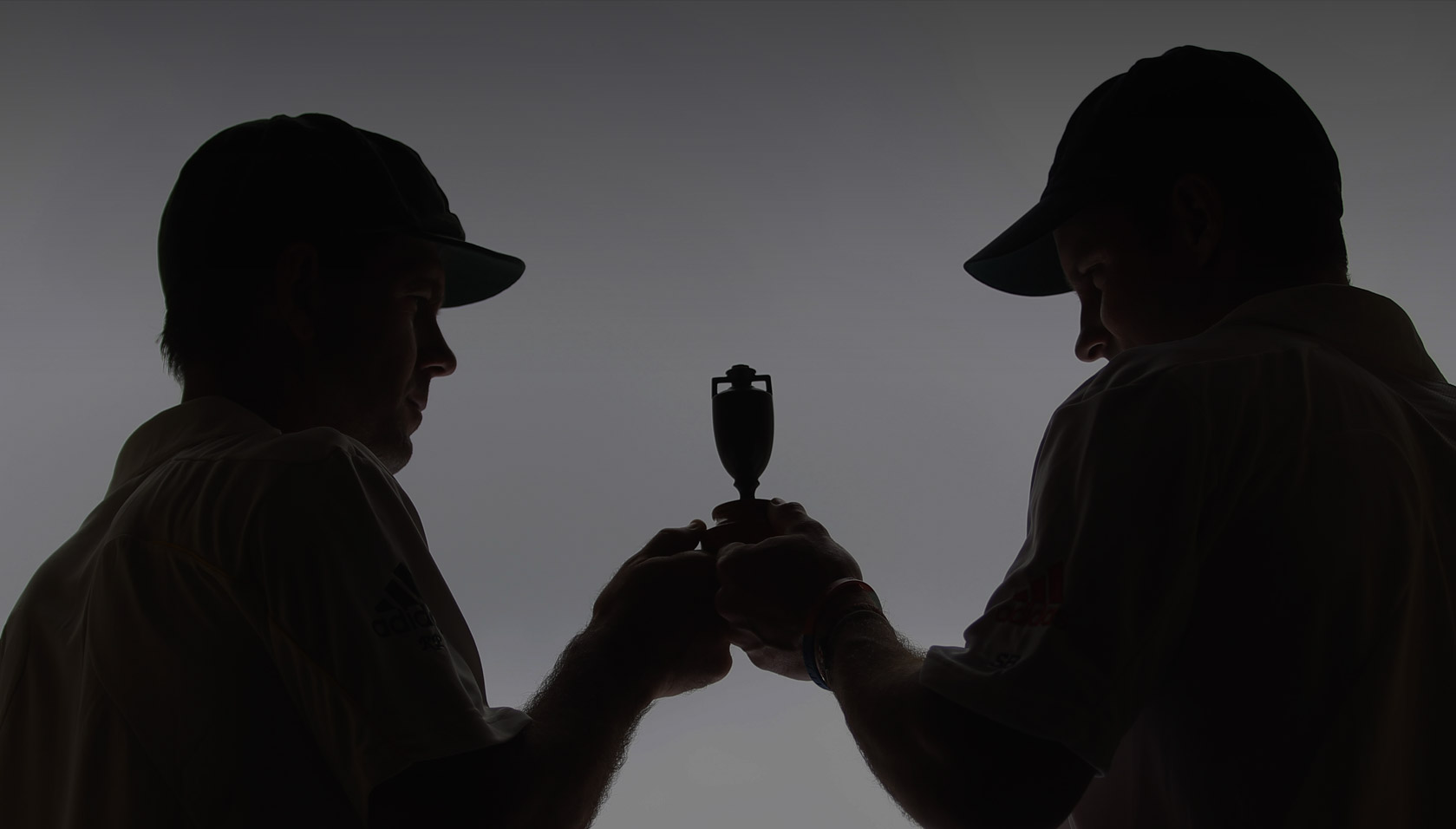 Ricky Ponting of Australia and Andrew Strauss of England pose with the Ashes urn at The Gabba in 2010